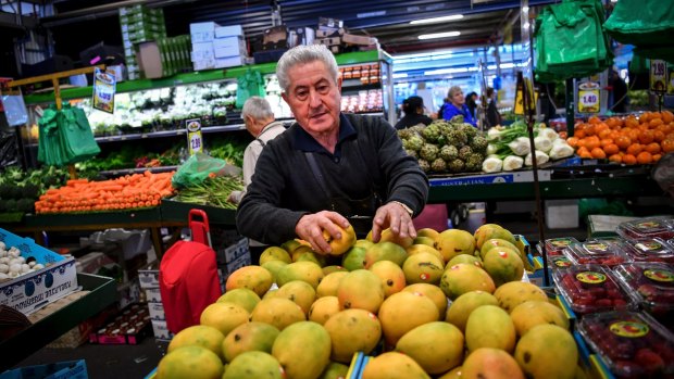 After a year off with throat cancer, Danny Luppino couldn't wait to get back to his Dandenong Market stall of 54 yers, where he feels he belongs. 