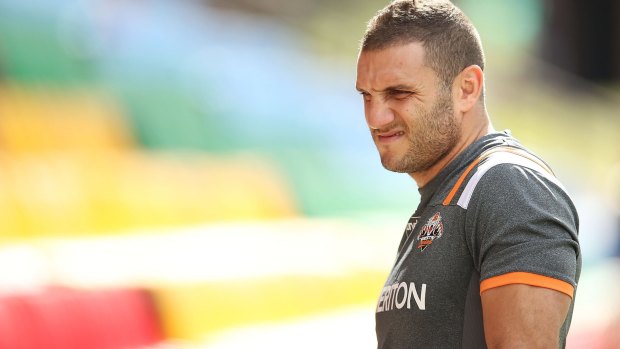 Sidelined: Robbie Farah suffered a knee injury in the Tigers' trial match against Cronulla.
