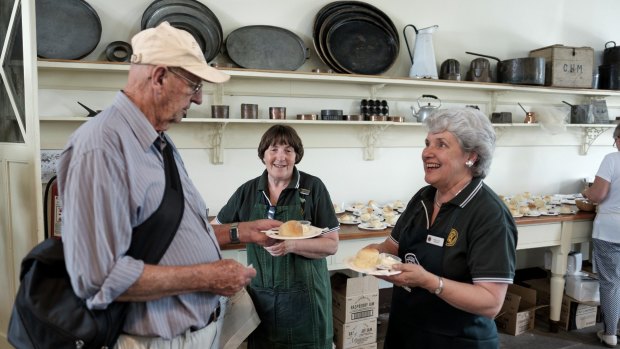 Machelle Crichton, left, and Carol Clay served their Country Women's Association scones. 