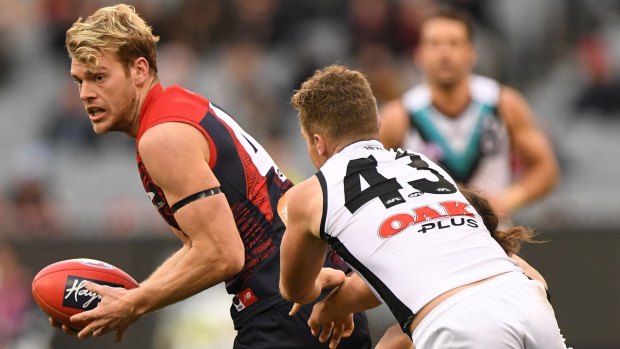 Jack Watts' father says his son was made to look a 'reprobate' by the Demons. 