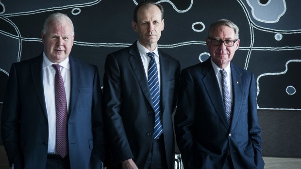 ANZ chief executive-designate Shayne Elliott (centre) will try to retool the bank's Asian businesses, when he succeeds CEO Mike Smith (left) next month. Chairman David Gonski is to the right. 