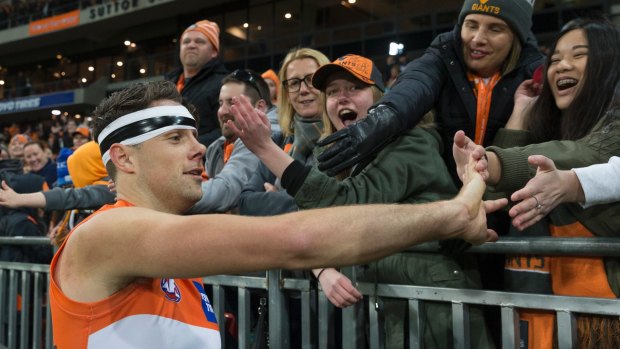 Main man: Josh Kelly enjoys the victory with fans.
