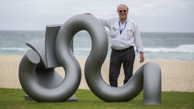 Canberra artist Michael Le Grand has been named the sole recipient of the Artistic Excellence Program 2015. He is pictured here with his sculpture Recoil which is being displayed at Sculpture by the Sea in Bondi.