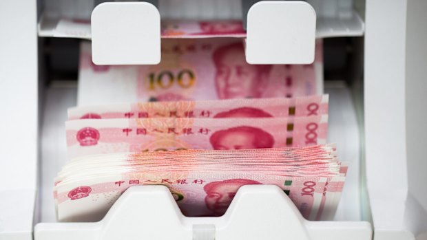 Banks and other financial institutions in China will have to report all domestic and overseas cash transactions larger than 50,000 yuan ($9984), compared with 200,000 yuan previously, the central bank said on Friday.