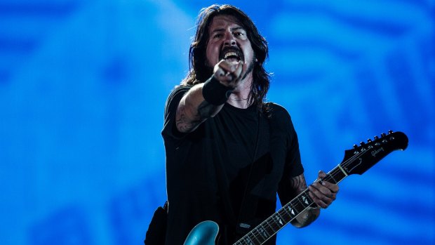 'Four Jager shots and a bunch of beer': Dave Grohl says he was wasted at Glastonbury.