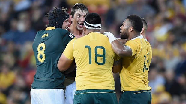 Stoush: Eben Etzebeth wrestles with Allan Alaalatoa during the Rugby Championship match between the Wallabies and Springboks at Suncorp Stadium.