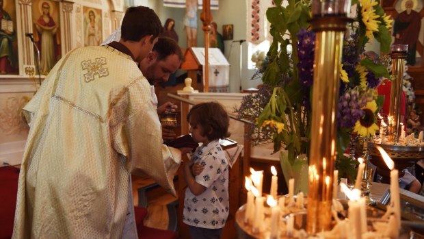 Children celebrated Christmas during the church service: ''There's not a lot of emphasis on gifts ... it's a bit more spiritual''