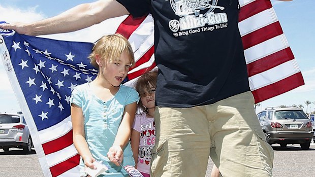 Supporters arrive to see Donald Trump in Phoenix on Saturday.