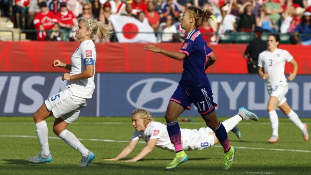 Reality bites: Bassett watches as her clearance goes into England's net.