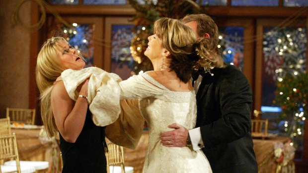 Action from <i>Days of Our Lives</i>:  Lauren Koslow, Alison Sweeney and Josh Taylor at a wedding gone soapily wrong.