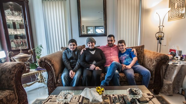 Wahiba Omran, who was diagnosed with multiple sclerosis 12 years ago, with her husband Mohamed Charara and sons Ali, 14, and Tarek, 12.