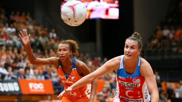 Sydney clash: Serena Guthrie of the Giants and Maddy Proud of the Swifts in action in February.