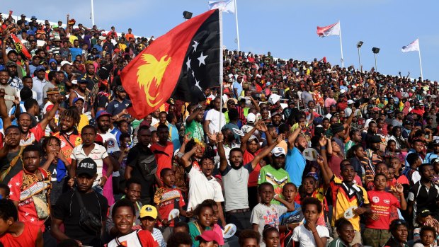Pumped: A boisterous home crowd enjoys the occasion in Port Moresby