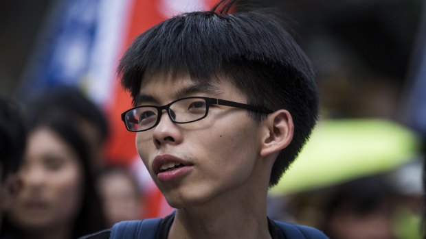 Joshua Wong, founder and convener of the student group Scholarism, marches during a pro-democracy rally in Hong Kong.