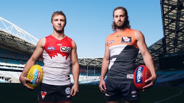 Leading the charge: Sydney Swan Kieren Jack and GWS Giant Callan Ward at ANZ Stadium.