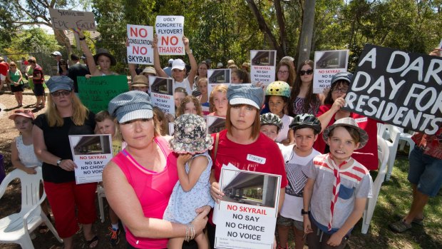 Murrumbeena residents Karlee Browning and Tracey Bigg attend a protest earlier this month against a proposed elevated railway line. 