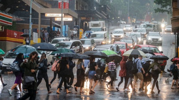As Cyclone Debbie began to hit the city thousands of people flooded Brisbane's CBD to catch transport home.