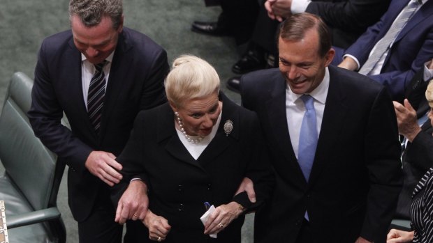 Bronwyn Bishop is dragged to the Speaker's chair by Prime Minister Tony Abbott and Christopher Pyne after the 2013 election. 