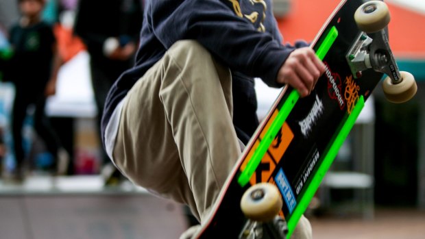 How do you park a skateboard? New road rules require it before using a mobile phone. 