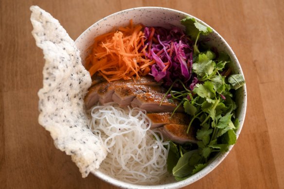 Vietnamese noodle salad with duck, rice cracker and fermented chilli dressing. 