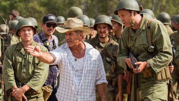 Mel Gibson directs actor Vince Vaughn on the set of <i>Hacksaw Ridge</i>.