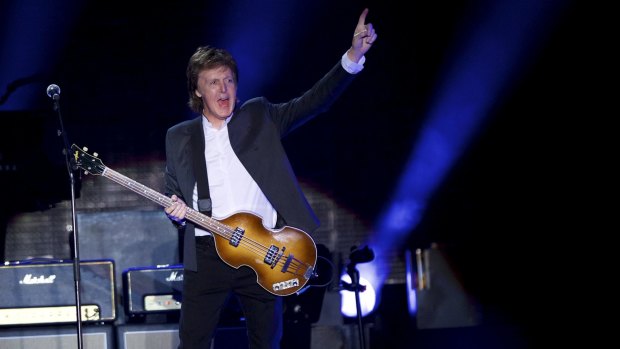 Sir Paul McCartney takes the stage for his performance at the Firefly Music Festival in Dover, Delaware on Friday night.
