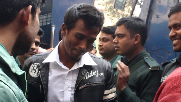 In hot water: Bangladeshi cricketer Rubel Hossain is led away after bail plea.