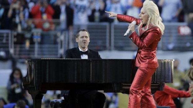Lady Gaga sings <em>The Star Spangled Banner </em>before the NFL Super Bowl 50 between the Denver Broncos and the Carolina Panthers on Sunday.