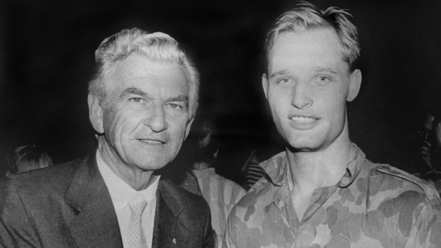 Michael Le Serve as an 18-year-old army private in 1989 with then-prime minister Bob Hawke.