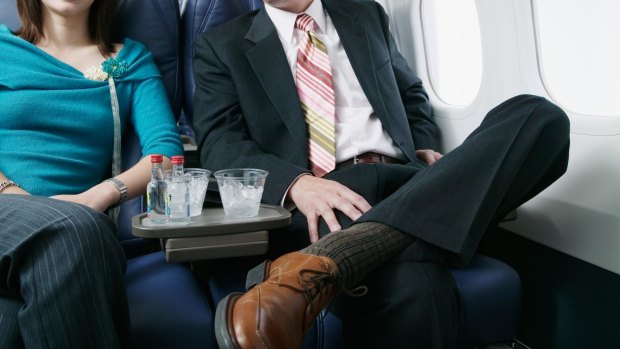The strangers may face misdemeanor or felony charges over the in-flight sex act.