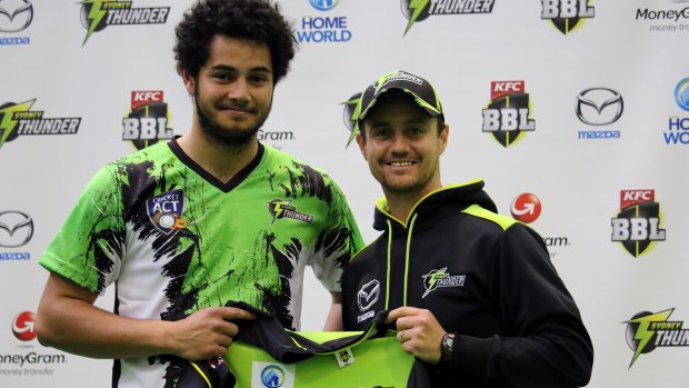 Fast bowler Joe Slater, with Beau Casson, has won a rookie contract with the Sydney Thunder.