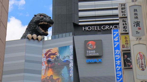 Godzilla statue at Toho cinemas, Shinjuku, Tokyo.