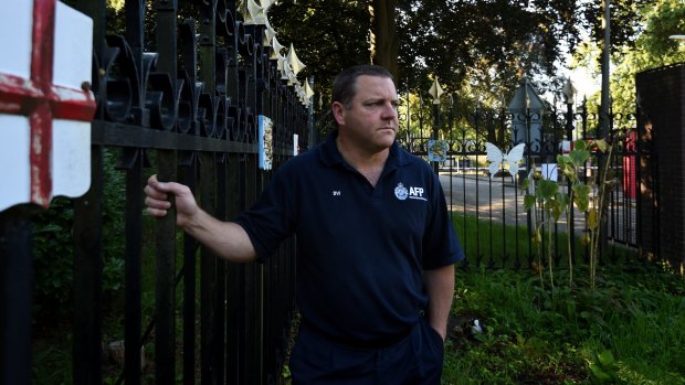 Australian Federal Police Senior Sgt Rod Anderson who was the head of the Disaster Victim Identification team at the MH17 crash site and later in The Hague, stands at the front gates of Hilversum military base where the bodies of the MH17 victims were brought once they landed in the Netherlands and where the DVI proccess took place. Hilversum, Netherlands. 