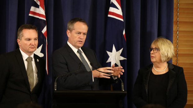 Opposition Leader Bill Shorten addresses the media during a joint press conference with shadow treasurer Chris Bowen and opposition spokeswoman for families and payments, Jenny Macklin.