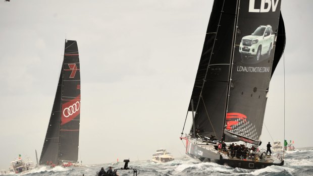 Into the lead: Comanche, right, is past Wild Oats XI and on track to break the record.