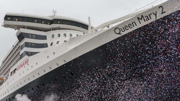 Confetti helps celebrate the launch of Cunard's Queen Mary 2 after a $177 million refit.