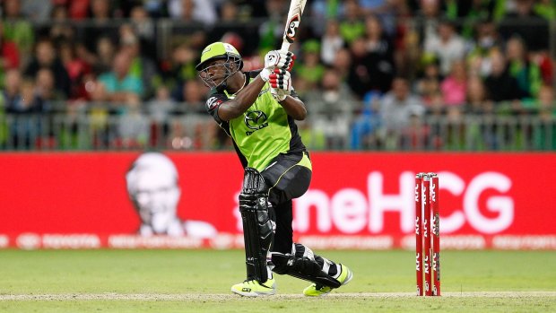 Big basher: Andre Russell hits a six against the Adelaide Strikers.