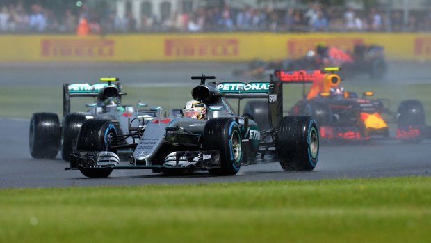 Out in front: Mercedes driver Lewis Hamilton leads in the British Formula One Grand Prix at the Silverstone racetrack.