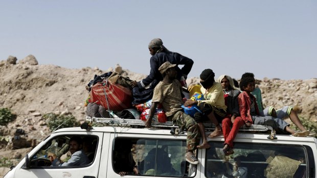 Fleeing Sanaa where a rocket base was hit with air strikes on Tuesday.