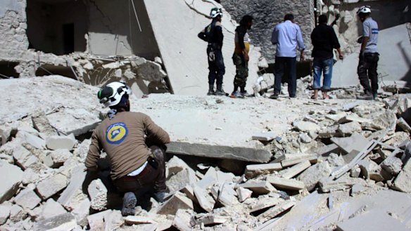 The aftermath of     airstrikes in the Bustan al-Qasr neighbourhood of Aleppo.