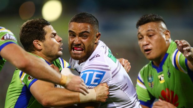 Dylan Walker of the Eagles is tackled during the round eight NRL match between the Canberra Raiders and the Manly Sea Eagles at GIO Stadium.