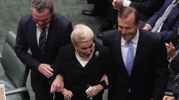 Bronwyn Bishop is dragged to the Speaker's chair by Prime Minister Tony Abbott and Christopher Pyne after the 2013 election. 