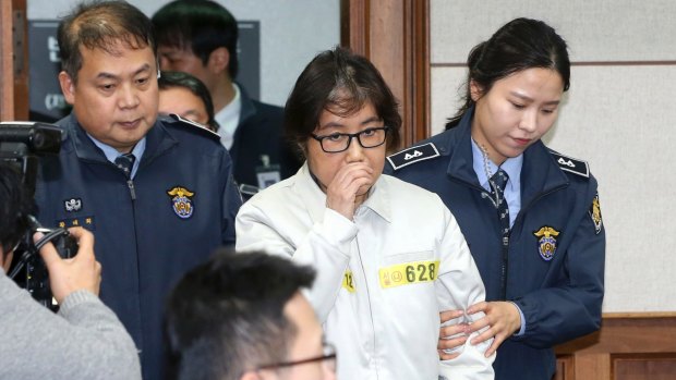 Choi Soon-sil, the jailed confidante of disgraced South Korean President Park Geun-hye, appears for the first day of her trial at the Seoul Central District Court.