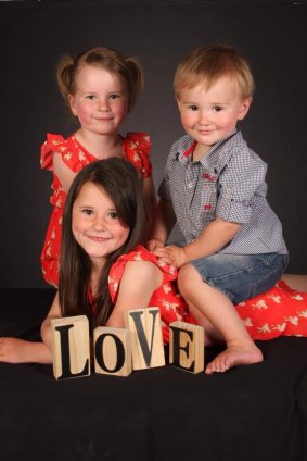 Ayla, 5, and Bria, 7, and Leland 2 in one of the photos ordered in a package from Littler Masterpiece Studio Pty Ltd.