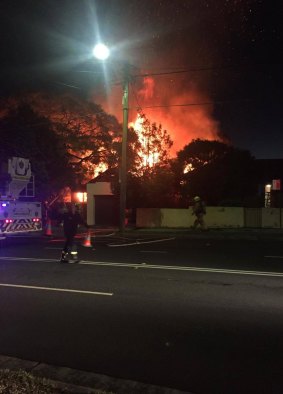 The house in Lane Cove was "fully alight", with a team of 26 firefighters tackling the blaze. 