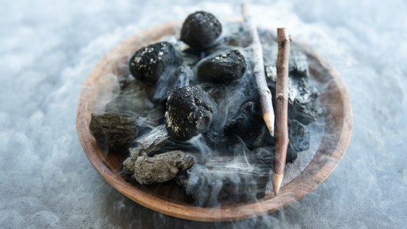 Plating like the dark nemesis of Donna Hay: Charcoal-dusted chocolate truffles.