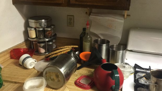 Pots and pans were strewn over the kitchen.