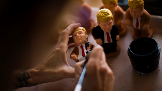 A Donald Trump minature gets painted.