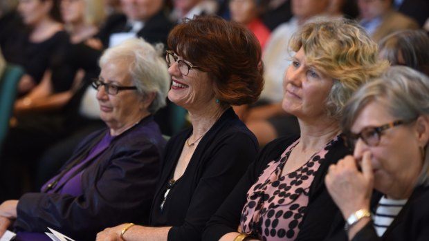 Journalist Geraldine Doogue and other mourners at the funeral for Adele Horin.