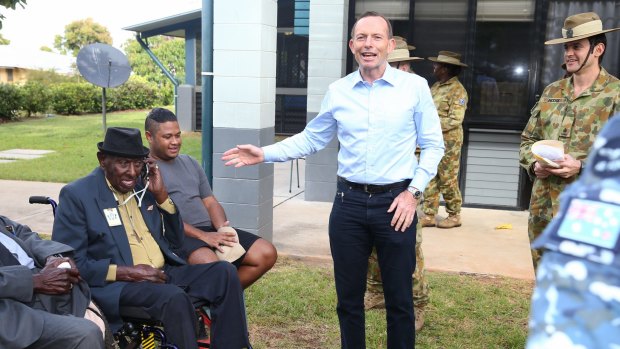 Tony Abbott and Palm Stephen during a medal presentation for veterans on Thursday Island.